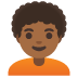 person, medium-dark skin tone, curly hair